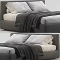 Modern Double Bed With Upholstered Headboard White Pillows And Gray Throw Blanket