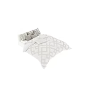 Single Bed In Minimalist Style With White Geometric Bedspread And Pillows