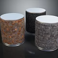 Decorative Cylindrical Stools With White Top And Stone Tile Sides In Brown Black Gray