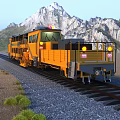Yellow Functional Rail Car On Railway Track With Mountain Landscape And Gravel