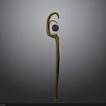 Yellow Abstract Sculpture With Curved Stem And Glass Eye Sphere