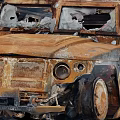 Rusted Military Vehicle With Open Door Damaged Body And Worn Rusty Exterior