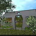 Chinese Style Entrance Gate With Gray Walls Arched Doorway And Surrounding Green Plants