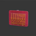 Red Square Clutch Bag With Orange Yellow Stripes And Gold Clasp On Black Surface