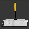 White Electrical Enclosure With Yellow Screwdriver And Connection Ports On Reflective Surface
