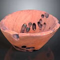 Carved Ceramic Bowl Sculpture With Reddish Brown Surface And Multiple Holes Design