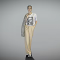 Woman Standing in White Graphic T-Shirt Beige Trousers Gray Coat Over Shoulder Against Gray Background