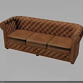 Elegant Orange Quilted Leather Sofa With Rounded Arms And Timeless Design