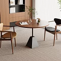 Modern Minimalist Dining Area With Round Wooden Table Two Chairs Vase And Potted Plant