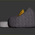 Gray Bean Bag Chair with Yellow Pillow and White Small Round Stool in Living Room
