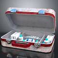 Essential Medical Devices In Open First Aid Kit With Medicine Bottles And Syringes