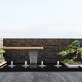 Modern Garden Feature Wall With Black Stone Water Fountains And Green Pine Plants