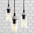 Pendant Lights With Transparent Glass Shades Black And Gold Vintage Filament Bulbs White Brick Wall