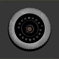 Tire With Black Wheel Rim Featuring Multiple Holes And Tread Pattern