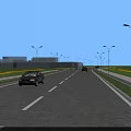 Urban Municipal Road With Lanes White Dividing Lines Green Belts Street Lamps And Distant Vehicles