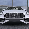White Mercedes AMG Sedan With Sporty Front Grille And Black Alloy Wheels