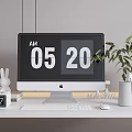 Apple iMac Desktop Setup On White Desk With Digital Time Green Plant And Rabbit Figurine