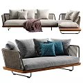 Stylish Outdoor Sofa With Gray Upholstery Blue Pillows Woven Details And Wooden Base