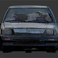 Old Blue Damaged Car With Rusty Body Broken Windows And Worn Exterior