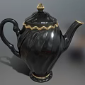 Elegant Black Teapot With Gold Accents On Lid Spout And Curved Handle For Home Living