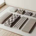 Different Shaped Soft Padded Cushions In Neutral Tones On Wooden Floor Mat