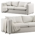 Cozy Light Colored Two Seater Sofa with Soft Pillows and Fringe Blanket