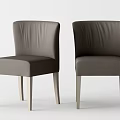Gray Dining Chairs With Curved Backrest And Sleek Wooden Legs Design