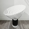 Clear Shade Table Lamp With Black Base On Wooden Floor White Wall Light Shadows