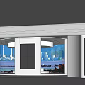 Modern Circular Exhibition Space with Curved White Walls and Large Windows Overlooking Seaview and Cityscape