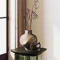 Textured Stoneware Vase With Dried Branches On Glass Table Near Coffee Cup And Curtain
