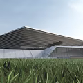 Modern Museum Building With Geometric Sloped Roof And Glass Facade In Grass Field