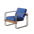 Sleek Tubular Metal Leisure Chair With Plush Blue Velvet Cushions And Natural Wood Accent Details