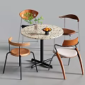 Modern Meeting Table and Chairs with Round Speckled Top Green Plant and Orange Fruits