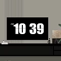 Modern TV Stand With TV Floor Lamp Potted Plant And Decorative Items On Wooden Floor