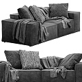 Stylish Two Seater Sofa With Decorative Pillows And Cozy Blanket In Modern Living Room Interior