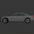 Gray Sporty Sedan With Sleek Design Black Wheels And Front Grille Reflection