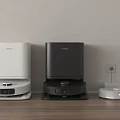 Smart Machines Ecovos Robot Vacuums White Black and Silver on Wooden Floor