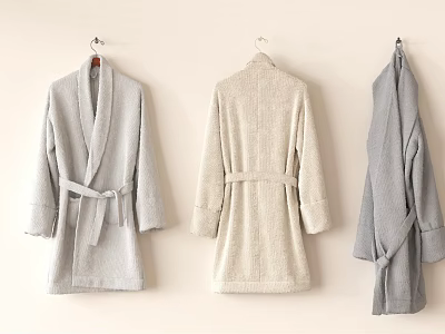 Plush Towel Bathrobes Hanging On Wall In Light Gray Beige And Dark Gray 3d model