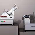 Two Commercial Meat Slicer Machines With Control Panels For Commercial Kitchen Use