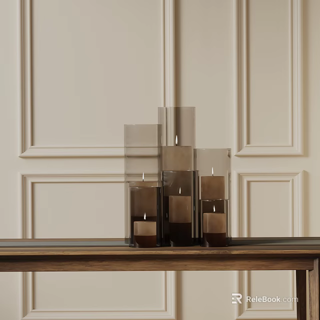 Elegant Decorative Ornament Set with Glass Candle Holders of Varying Heights on Wooden Table 3d model 