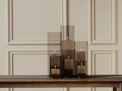 Elegant Decorative Ornament Set with Glass Candle Holders of Varying Heights on Wooden Table 3d model