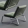 Modern Leisure Chair With Chrome Metal Frame Green Cushion And Slatted Backrest Design