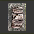 Neatly Stacked Wood Logs Arranged on Natural Textured Stone Mat Surface