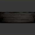 Used Car Tire With Worn Tread And Dark Surface On Gray Background