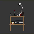 Weapon Assembly Process On Wooden Workbench With Tools Laptop Lamp And Paints