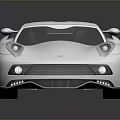 Sleek Silver Two Door Sports Car With Streamlined Body And Alloy Wheels