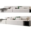 Modern Gray Sectional Sofa With Green White Cushions Gray Blanket Black Side Table Gold Lamp