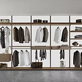 Modern Walk in Closet Interior With Wooden Shelves Hanging Clothes And Storage Bags