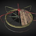 Small Spinning Amusement Ride With Circular Wooden Platform And Red Green Metal Frame