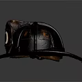 Vintage Black Firefighter Helmet with Worn Finish and Emblem Badges